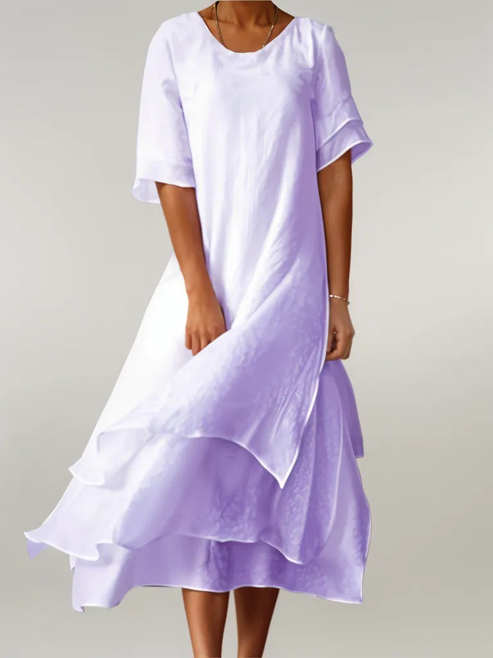 Jasmine | Geschichtetes Fließendes Midi-Kleid" can be rewritten as:

"Jasmine | Layered Flowing Midi Dress