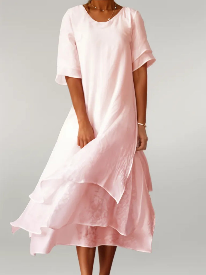 Jasmine | Geschichtetes Fließendes Midi-Kleid" can be rewritten as:

"Jasmine | Layered Flowing Midi Dress